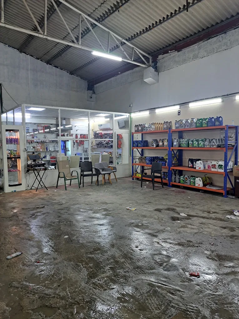 The front counter and shelves inside Al Batra Cars Washing